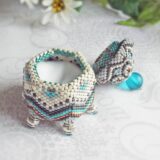 Beaded hexagon box in misty grays with accents of teal blue.