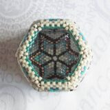 Beaded hexagon box in misty grays with accents of teal blue.